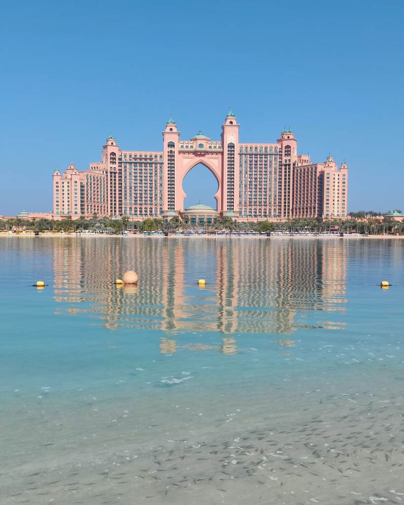 Atlantis the Palm in a divine morning light: tiny fish enjoying the crystal clear waters